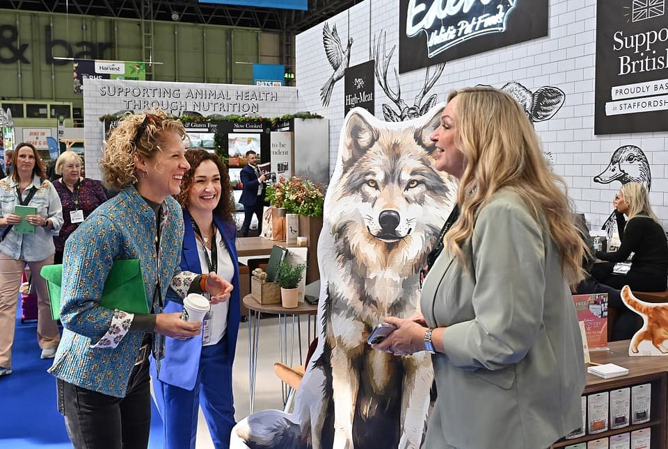 Figure 12. Eden Holistic Pet Foods' stand at PATS 2025 — "proudly based in Staffordshire" branding with natural product shelving. Field photo from the author's on-site collection, PATS 2025.