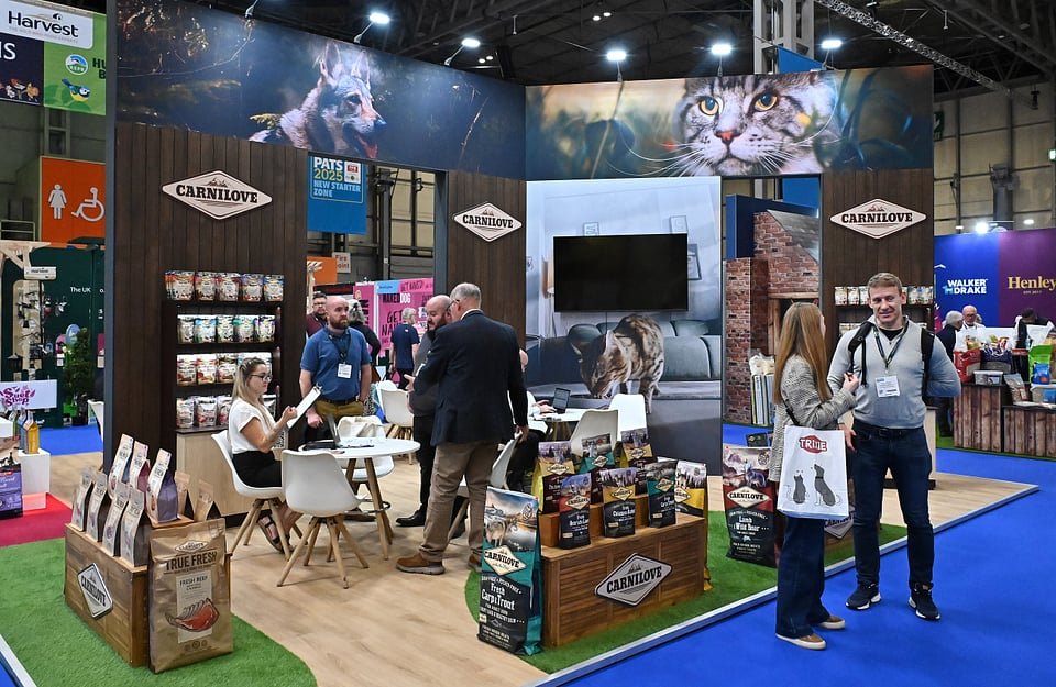 Figure 23. Carnilove's corner booth at PATS 2025, with the New Starter Zone overhead branding visible above the stand. Field photo from the author's on-site collection, PATS 2025.