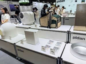 Pet boarding and pet hotel services on display at a pet industry expo in China
